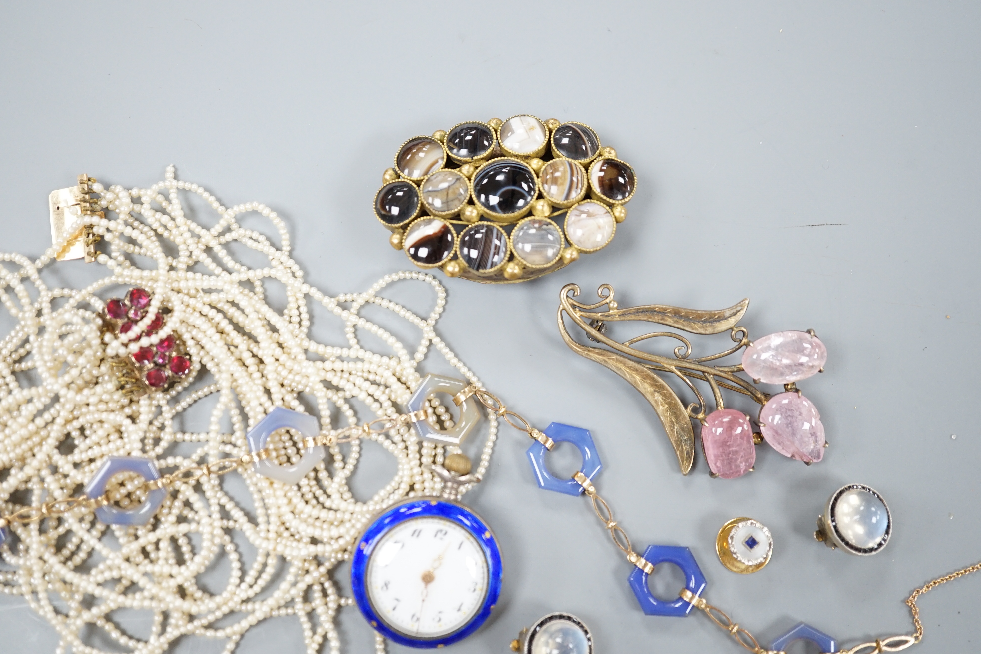 A quantity of mixed Victorian and later jewellery, including yellow metal and white opal scroll bar brooch, 18ct dress stud, 9ct and agate set necklace, seed pearl necklace(a.f.), enamelled peacock brooch, gem set Victor
